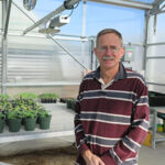 Dan Egel in greenhouse