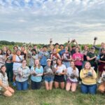 Figure 2. Purdue Student Farm Organization (PSFO) students were helping Miranda Purcell to harvest grapes at The Meigs Horticulture Facility (Photo by PSFO member).